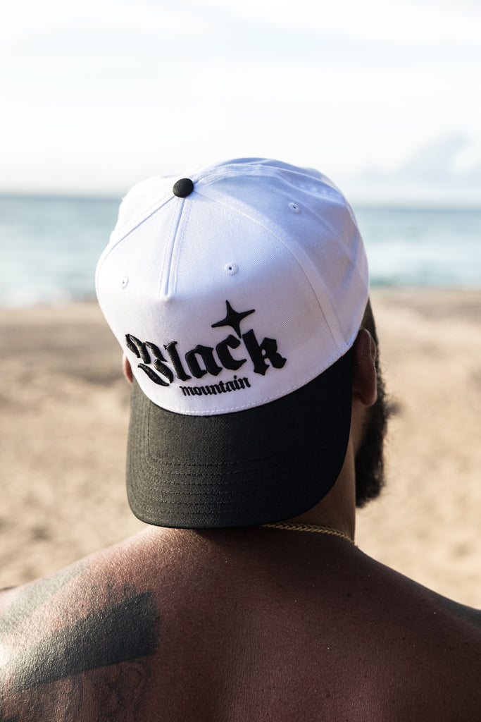 The Black Mountain Snapback Hat — White with Black Brim